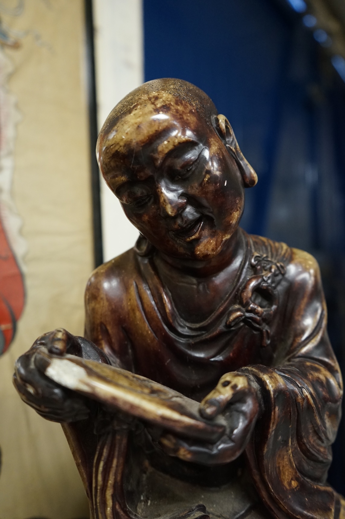 A large Chinese soapstone figure of a Luohan, 48cm